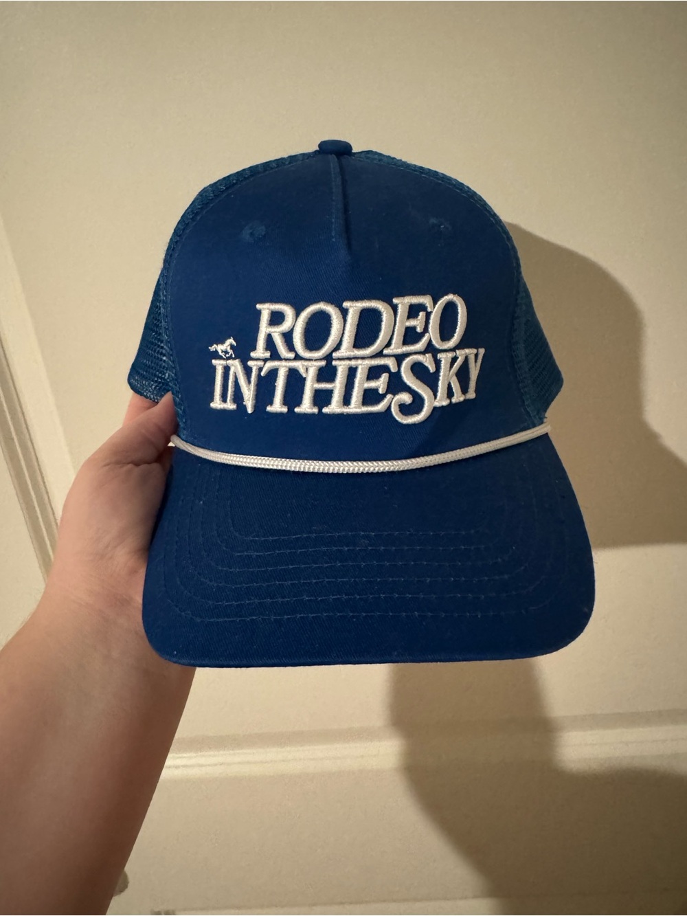 Rodeo in the sky Blue Trucker Hat